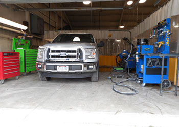 Truck in collision repair bay